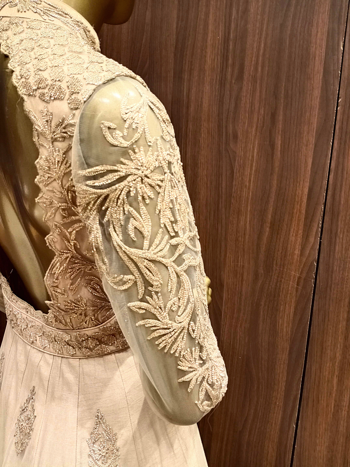Beige Embellished Raw Silk Anarkali with Resham embroidery in Ethnic Pattern