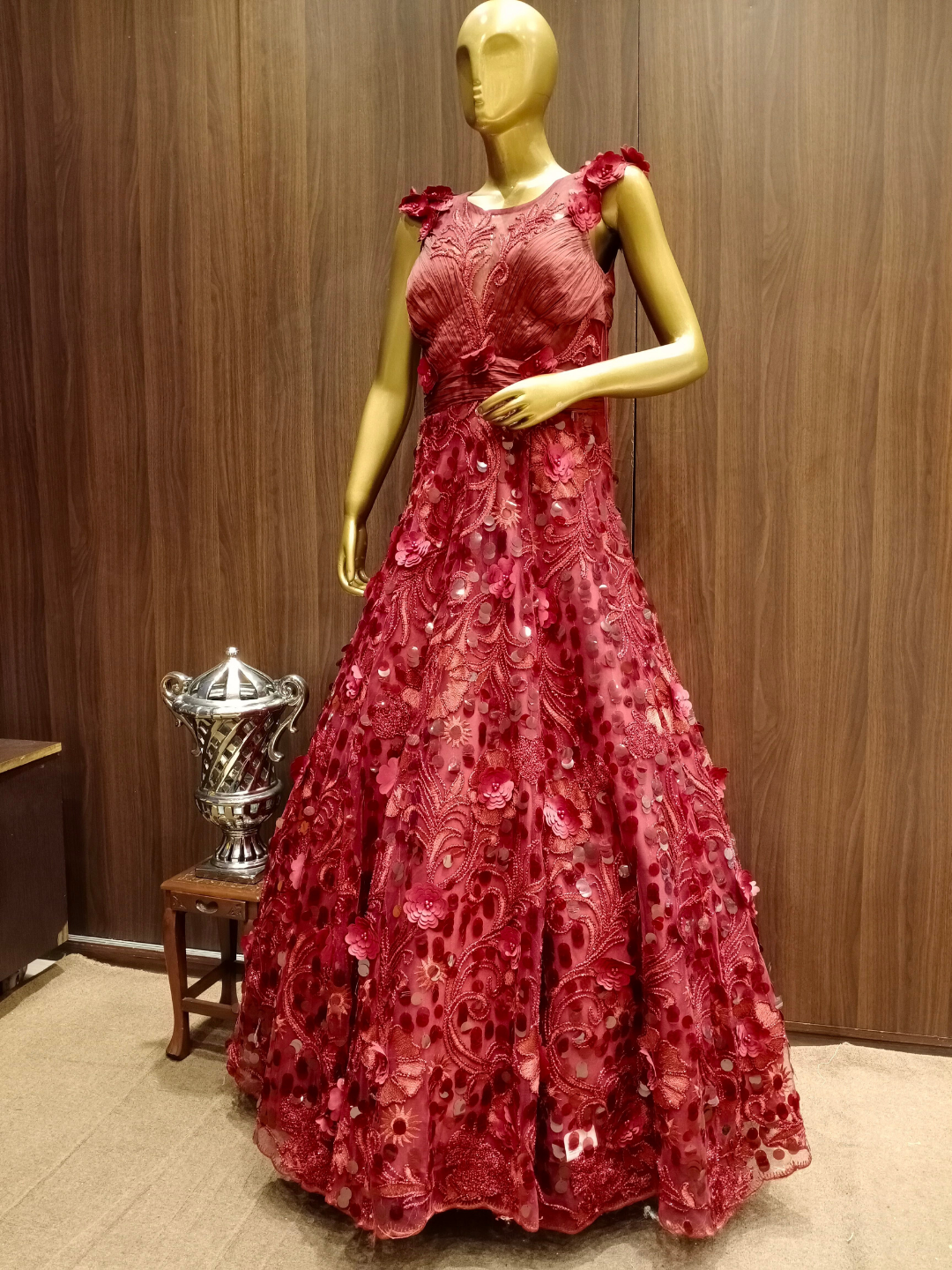 Maroon Embellished Net Gown with Pleating Ruching Neckline & Hand Sequence Embroidery