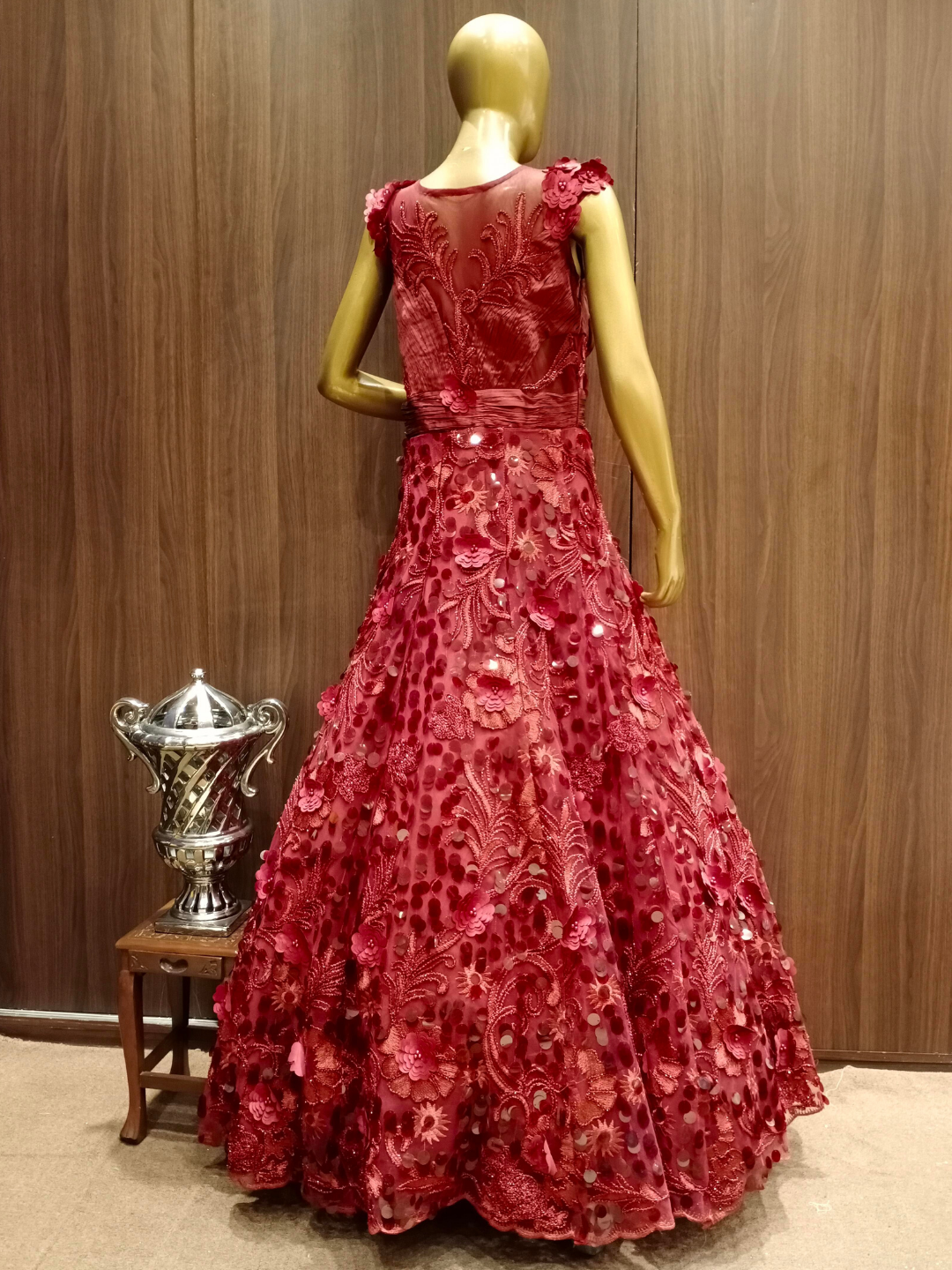 Maroon Embellished Net Gown with Pleating Ruching Neckline & Hand Sequence Embroidery