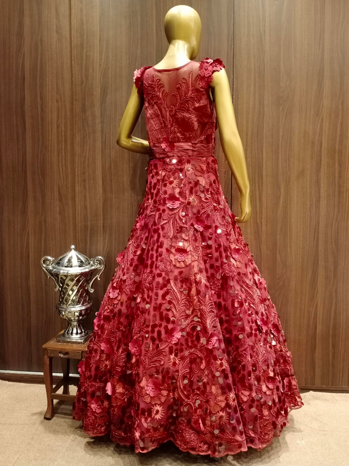 Maroon Embellished Net Gown with Pleating Ruching Neckline & Hand Sequence Embroidery