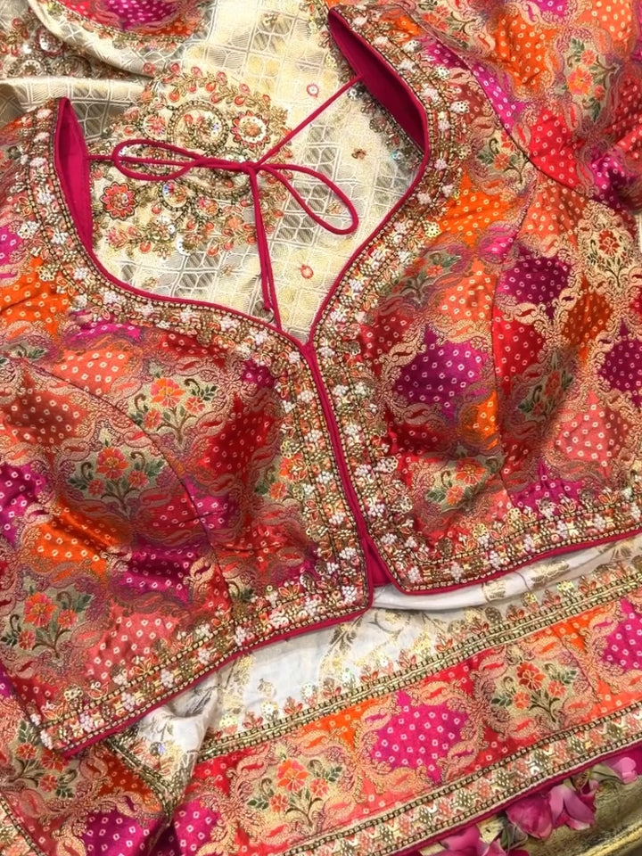 Banarasi Silk Bandhani & Zari Woven Saree with Multicolor Embroidered Blouse in Ivory & Multicolor