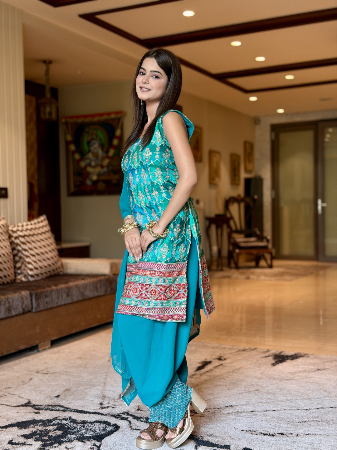 Crepe Heavy Sequin & Zari Embroidered Sleeveless Kurti with Georgette Salwar and Dupatta in Turquoise