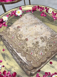 Banarasi Silk Zari Woven & Kundan Embroidered Scalloped Border Saree in Cream