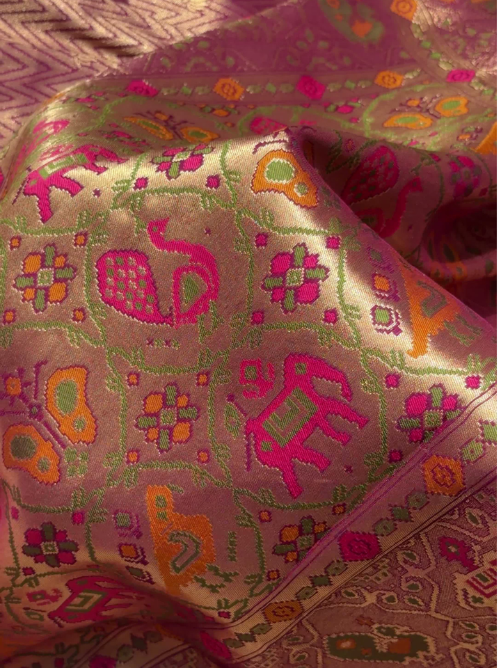Patola Weave Banarasi Silk Saree with Animal Motif in Magenta