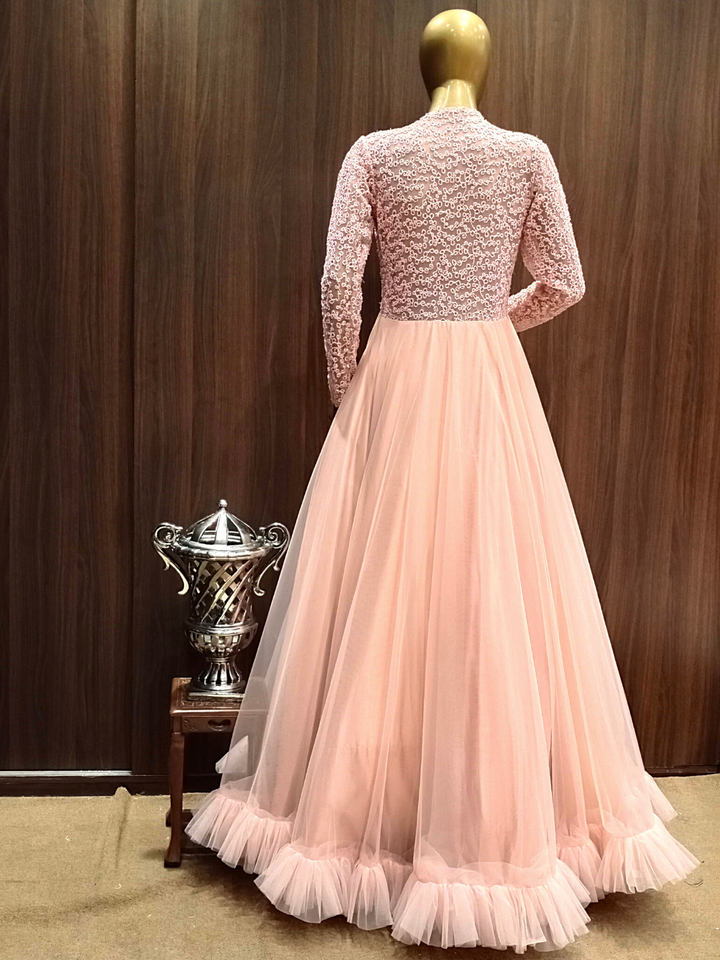 Pastel Peach Flared Gown With Ruffled Hemline and Thread Embroidery