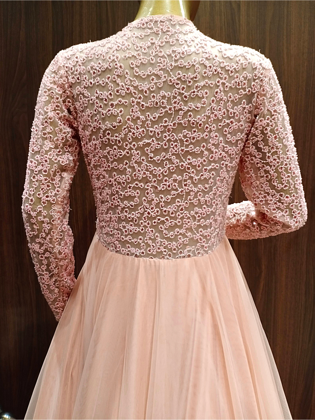 Pastel Peach Flared Gown With Ruffled Hemline and Thread Embroidery