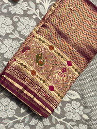 Patola Weave Banarasi Silk Saree with Animal Motif in Magenta