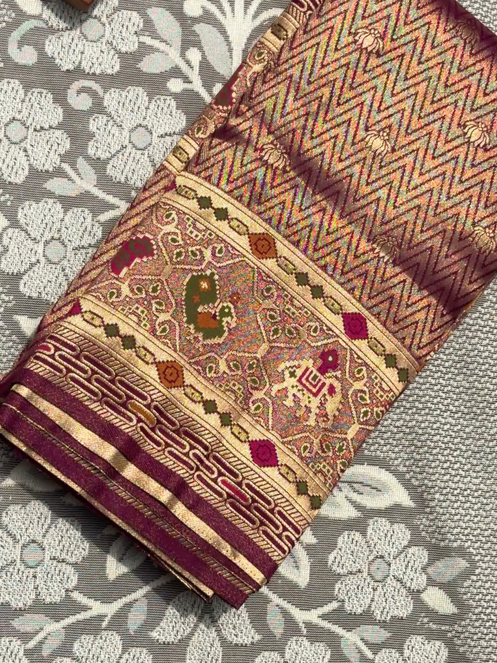 Patola Weave Banarasi Silk Saree with Animal Motif in Magenta