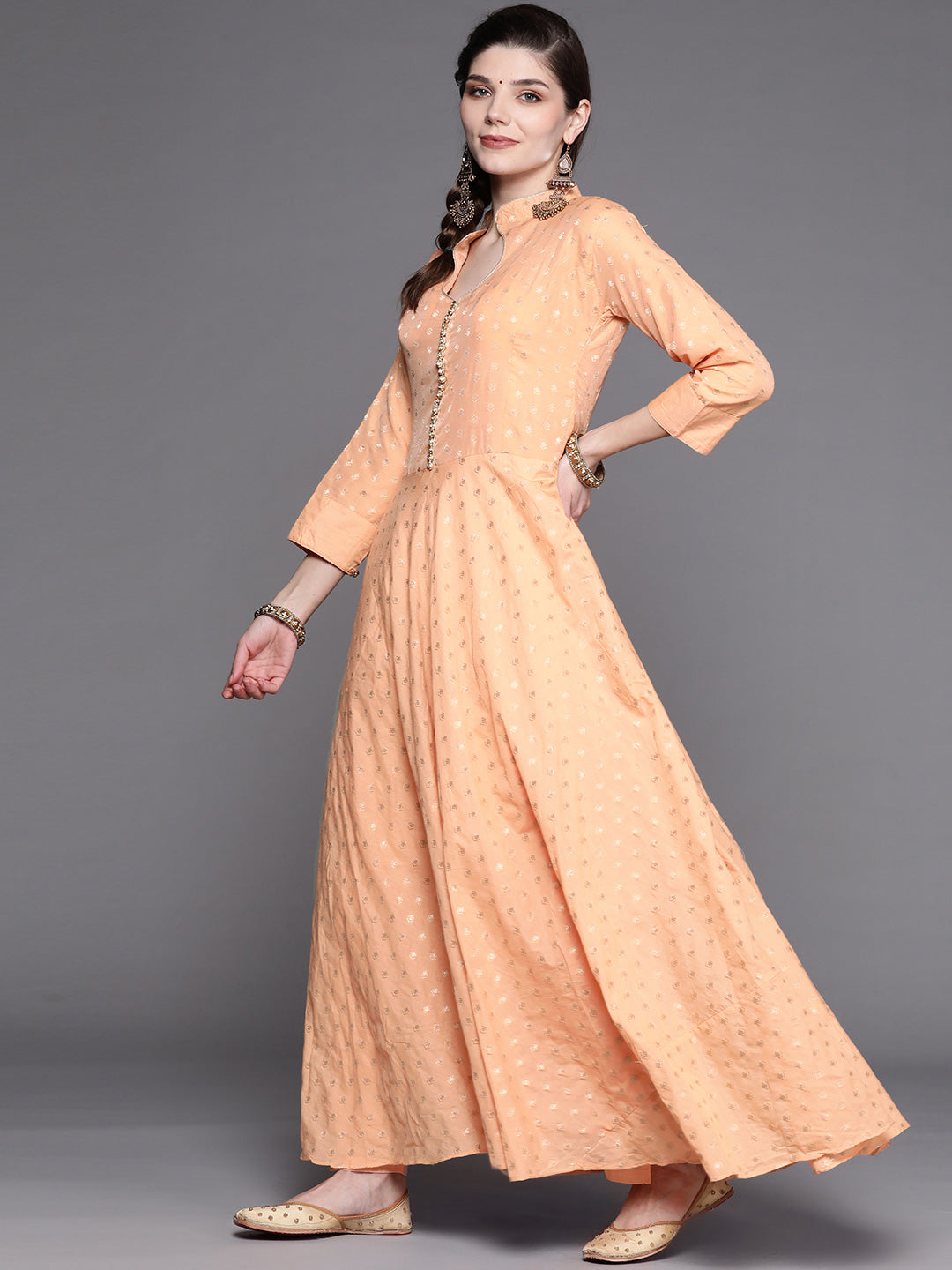 Peach Banarasi Weaving Anarkali Suit With Contrast Bandhej Foil Dupatta & Gold Buttons