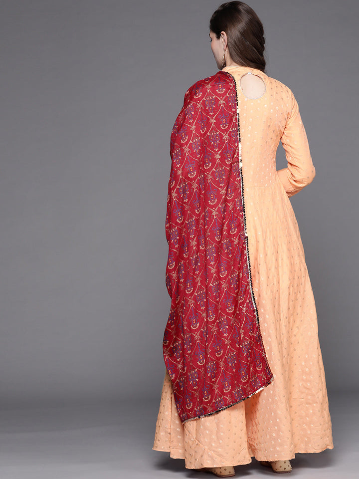 Peach Banarasi Weaving Anarkali Suit With Contrast Bandhej Foil Dupatta & Gold Buttons