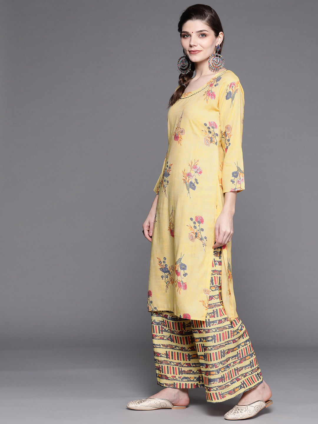 Pastel Yellow Floral Scalloped hemline Kurta with Abstract Print Palazzo
