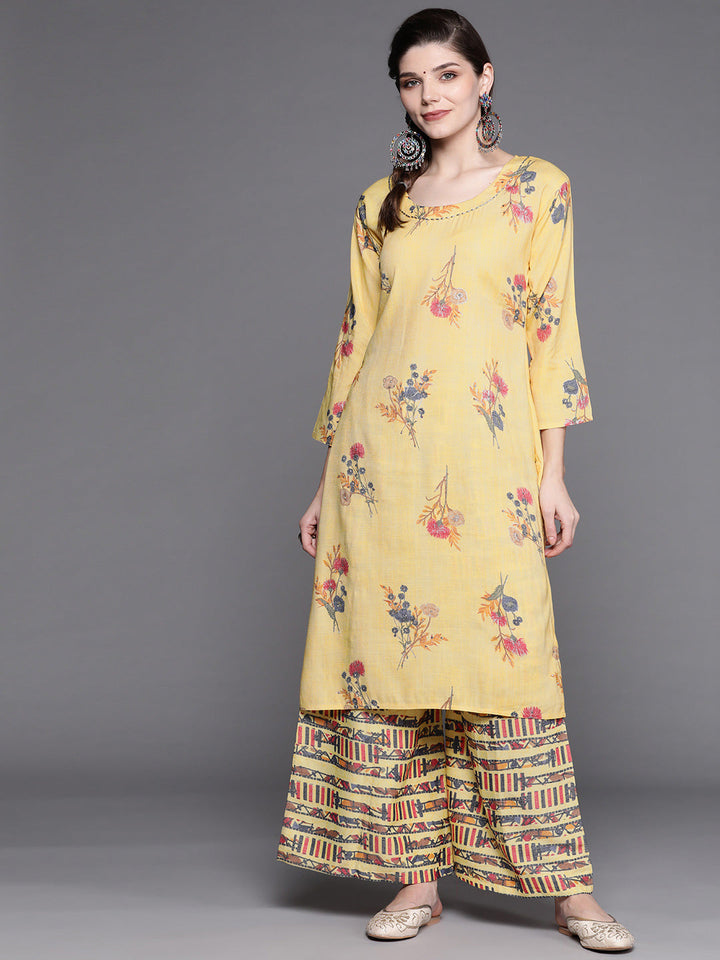 Pastel Yellow Floral Scalloped hemline Kurta with Abstract Print Palazzo
