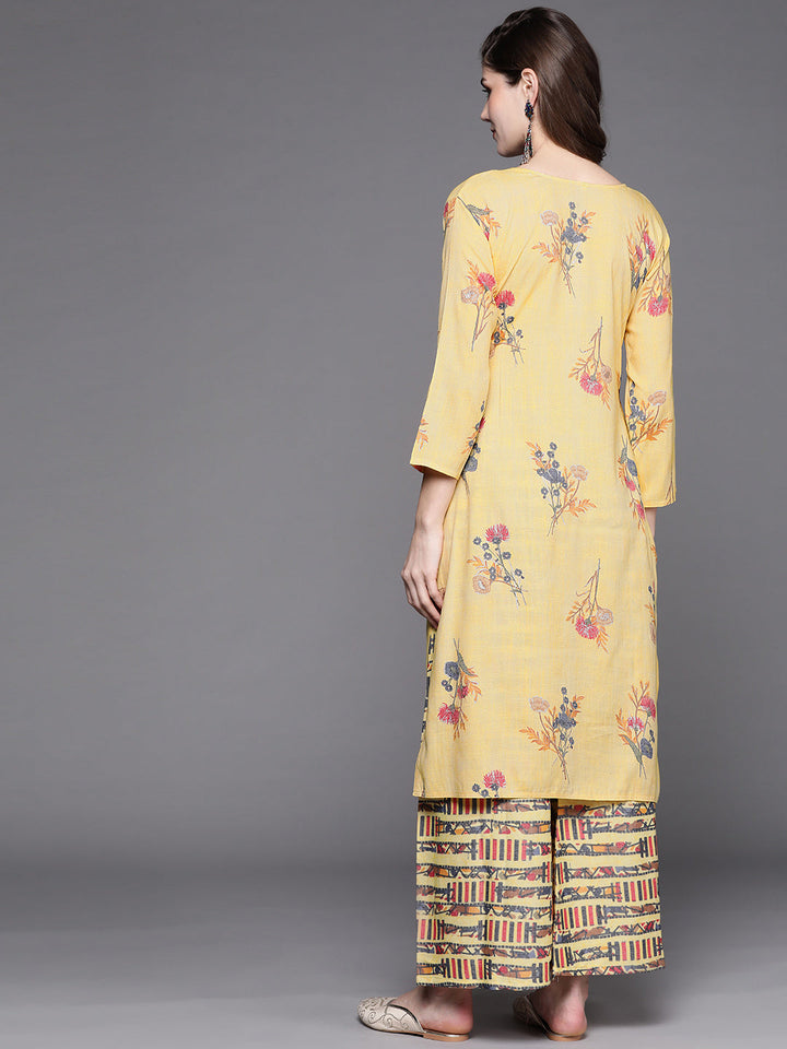 Pastel Yellow Floral Scalloped hemline Kurta with Abstract Print Palazzo