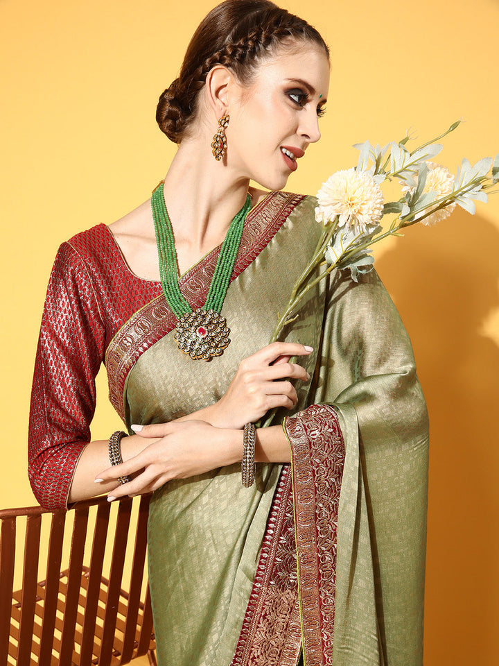 Mehendi Green Brasso Self Design Saree With Geometrical Weaves