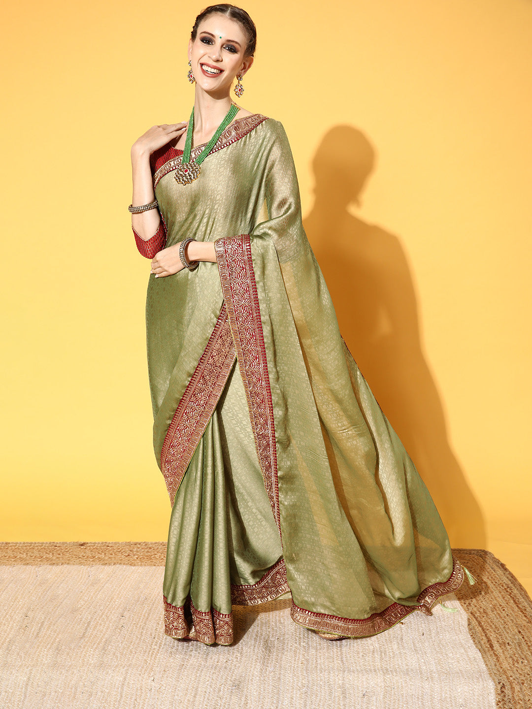 Mehendi Green Brasso Self Design Saree With Geometrical Weaves