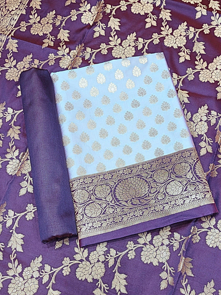 Banarasi Handloom Dress Material with Contrast Color Weaving & Floral Tasseled Dupatta