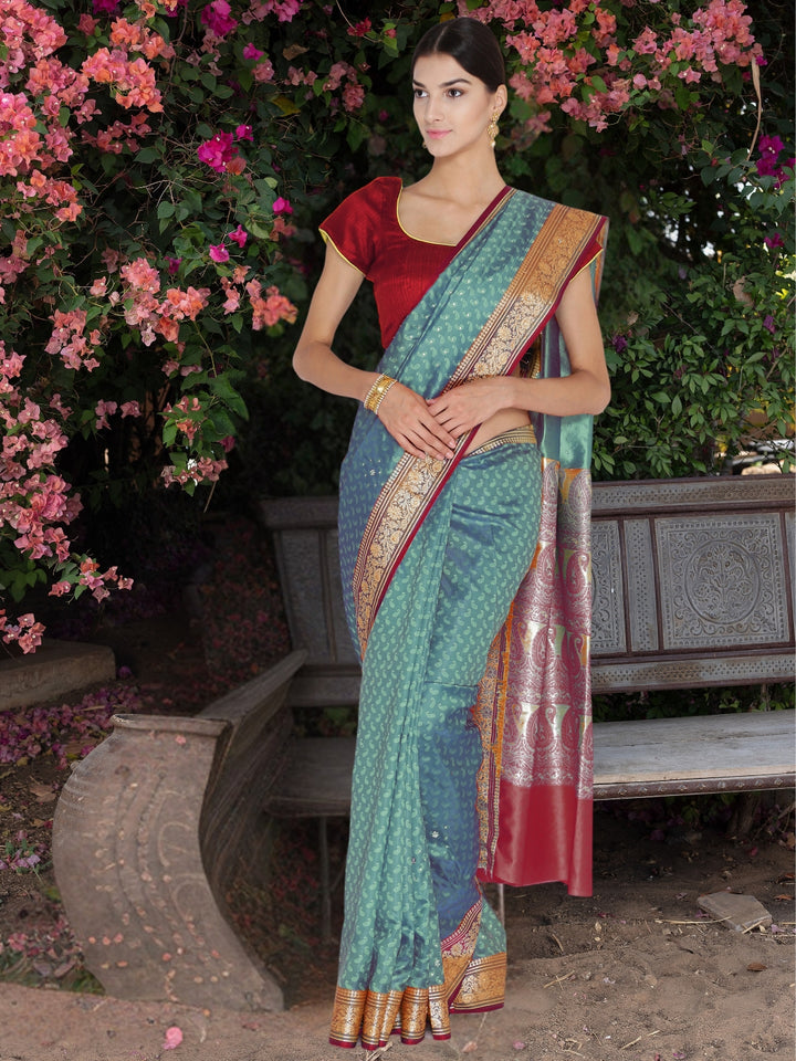Chhabra 555 Peacock Blue Banarasi Silk saree with Zari Woven paisleys and Rich Contrast Border