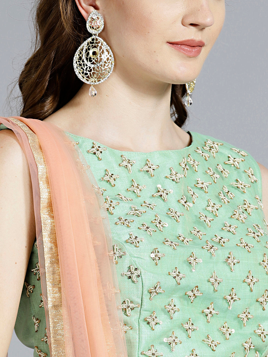 Layered Sequinned Lehenga with Tassles Embroidered Blouse