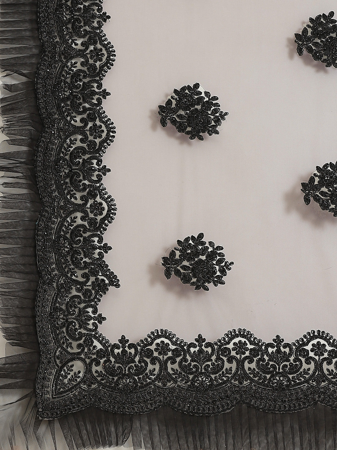 Grey Net Frills & Pleats Saree with Black Contrast Resham Embroidery