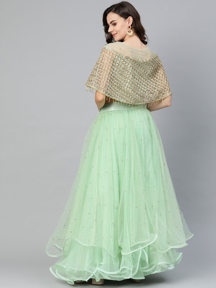 Cape Style Tassled Crop Top Blouse and foil print layered lehenga