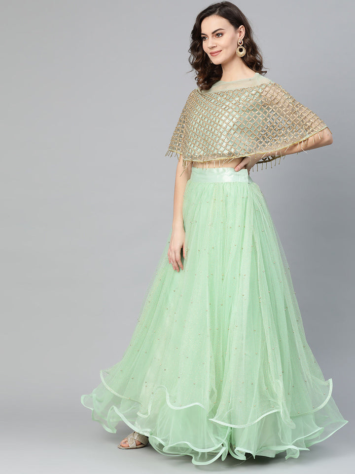 Cape Style Tassled Crop Top Blouse and foil print layered lehenga
