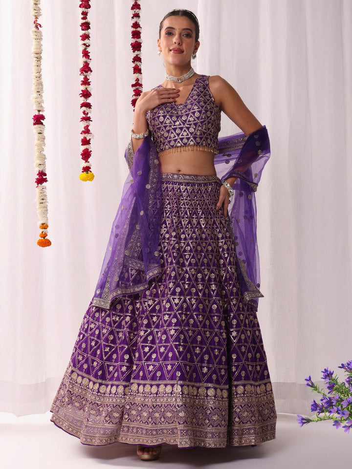 Sequinned Lehenga Set with Tassled Choli