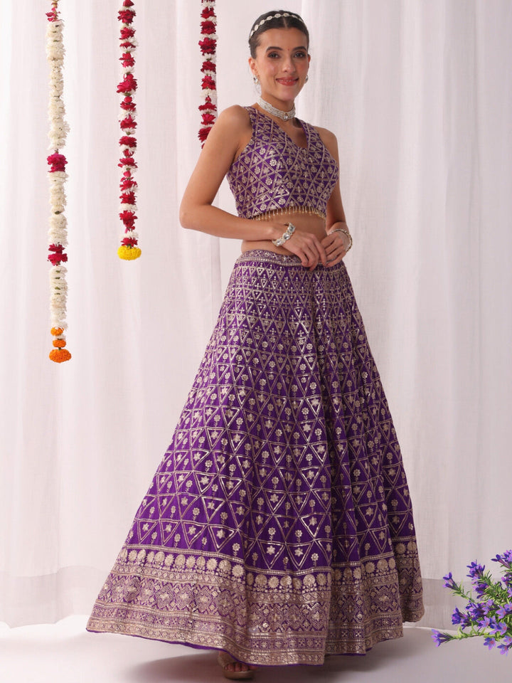 Sequinned Lehenga Set with Tassled Choli