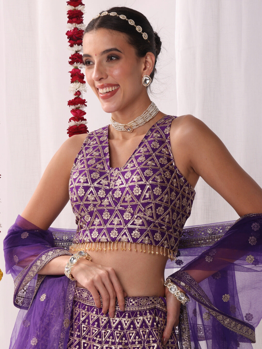 Sequinned Lehenga Set with Tassled Choli
