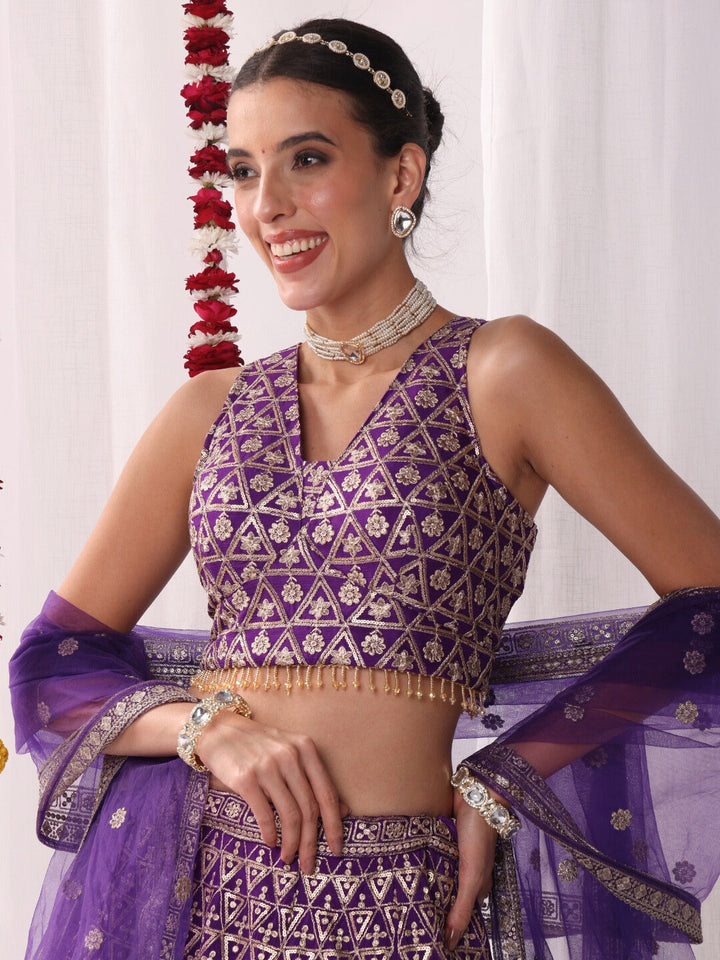 Sequinned Lehenga Set with Tassled Choli