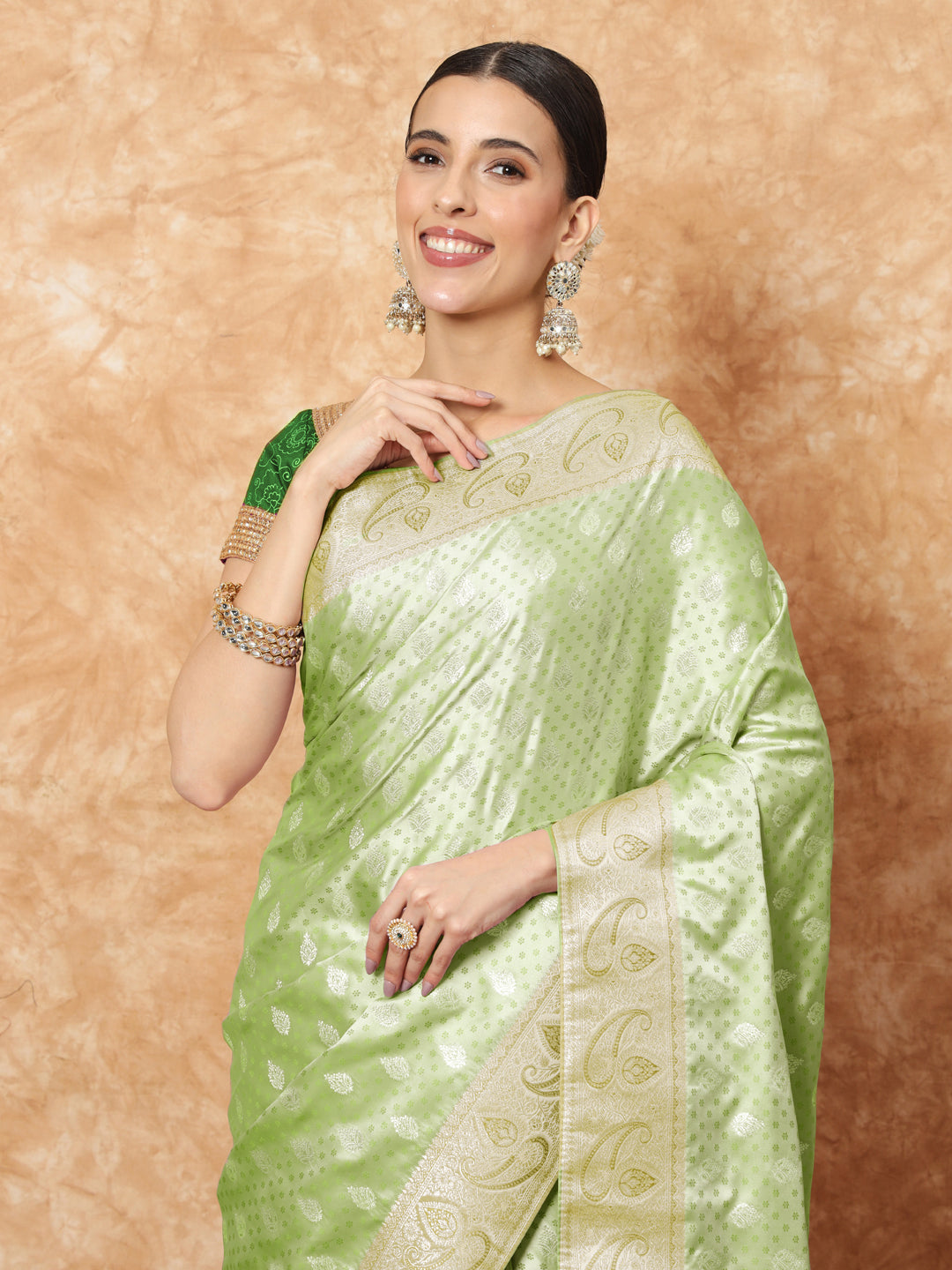 Banarasi Pastel Handloom Silk Saree with Paisely Border