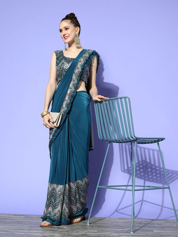 Draped Blue Lycra Ruffles Saree & Sequins Embellished Blouse & Pleats