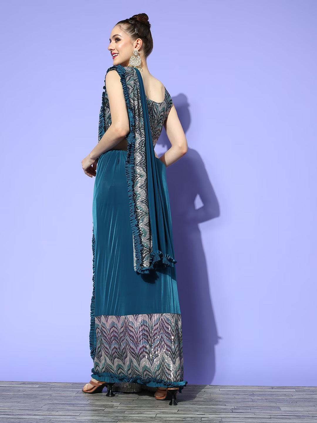 Draped Blue Lycra Ruffles Saree & Sequins Embellished Blouse & Pleats