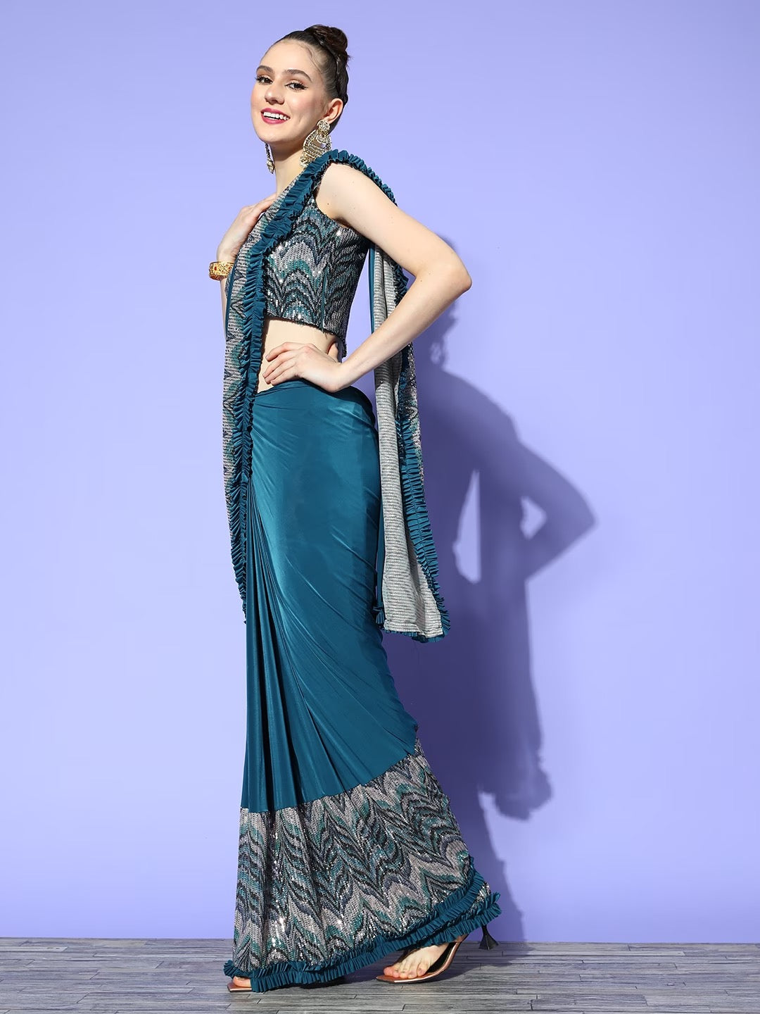 Draped Blue Lycra Ruffles Saree & Sequins Embellished Blouse & Pleats