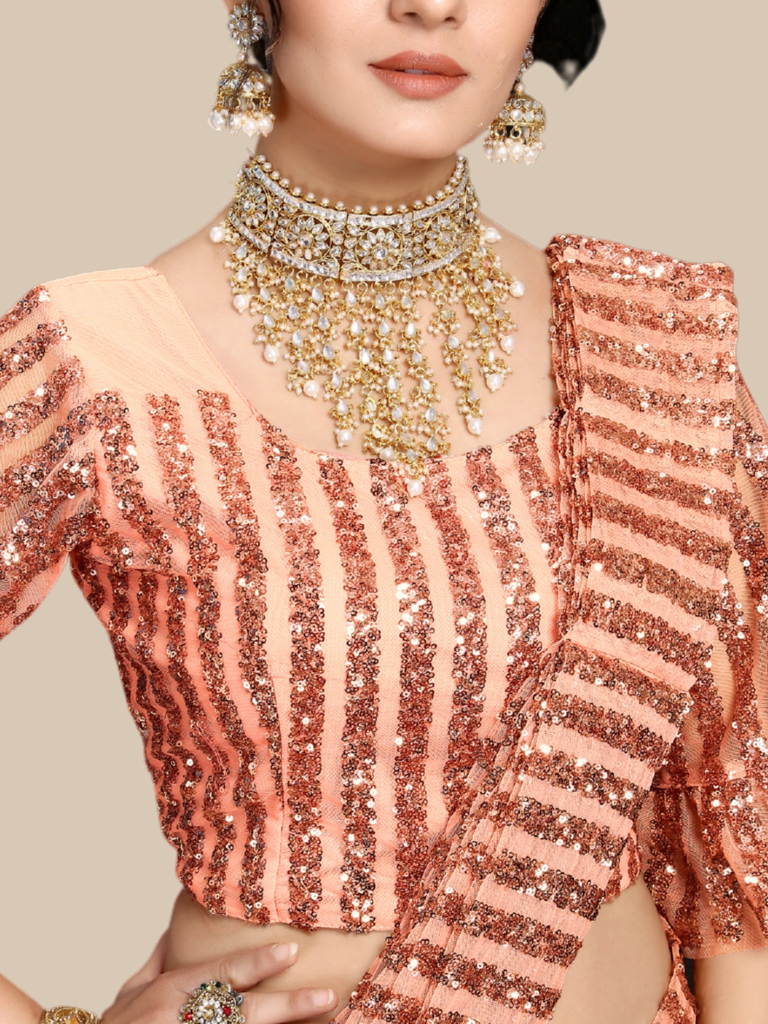 Peach Metallic Sequinned Party Wear Saree with Bell Sleeves Blouse