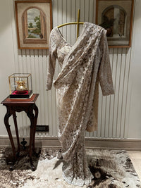 Elegant Beige Embroidered Net Saree