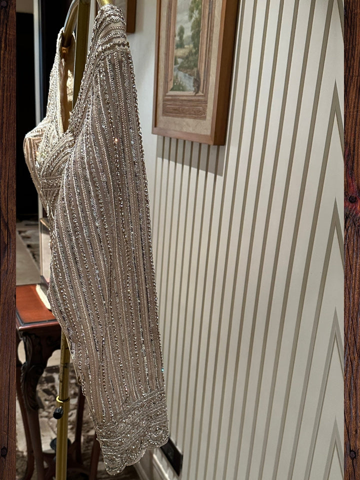 Elegant Beige Embroidered Net Saree