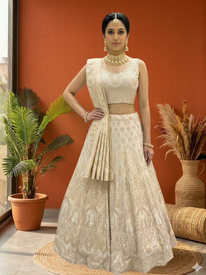 Ivory Tissue Lehenga Choli with Golden Zari Mughal Buti Print & Mirror Embellishments with Floral Buti Dupatta