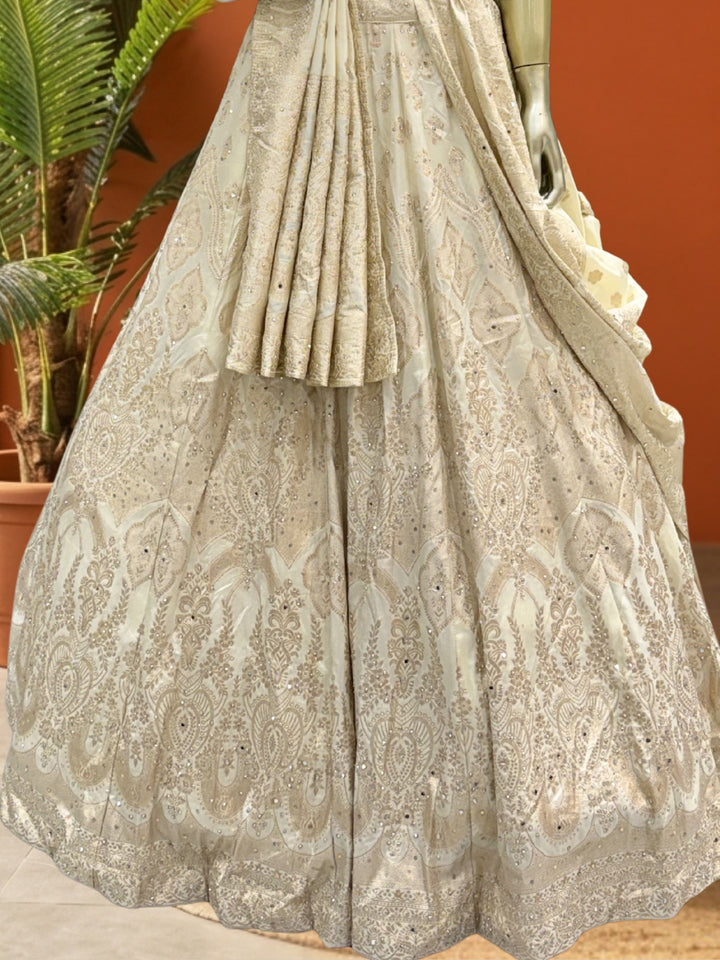 Ivory Tissue Lehenga Choli with Golden Zari Mughal Buti Print & Mirror Embellishments with Floral Buti Dupatta