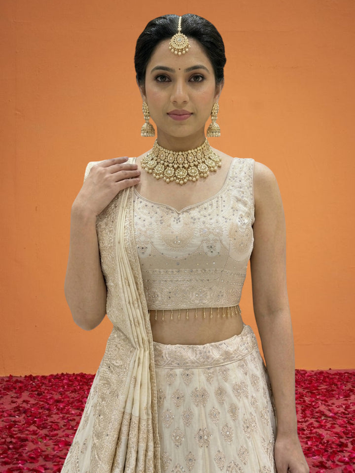Ivory Tissue Lehenga Choli with Golden Zari Mughal Buti Print & Mirror Embellishments with Floral Buti Dupatta