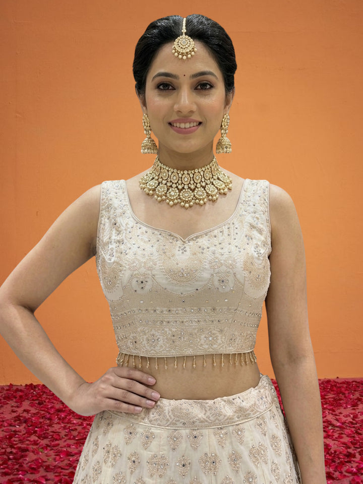 Ivory Tissue Lehenga Choli with Golden Zari Mughal Buti Print & Mirror Embellishments with Floral Buti Dupatta
