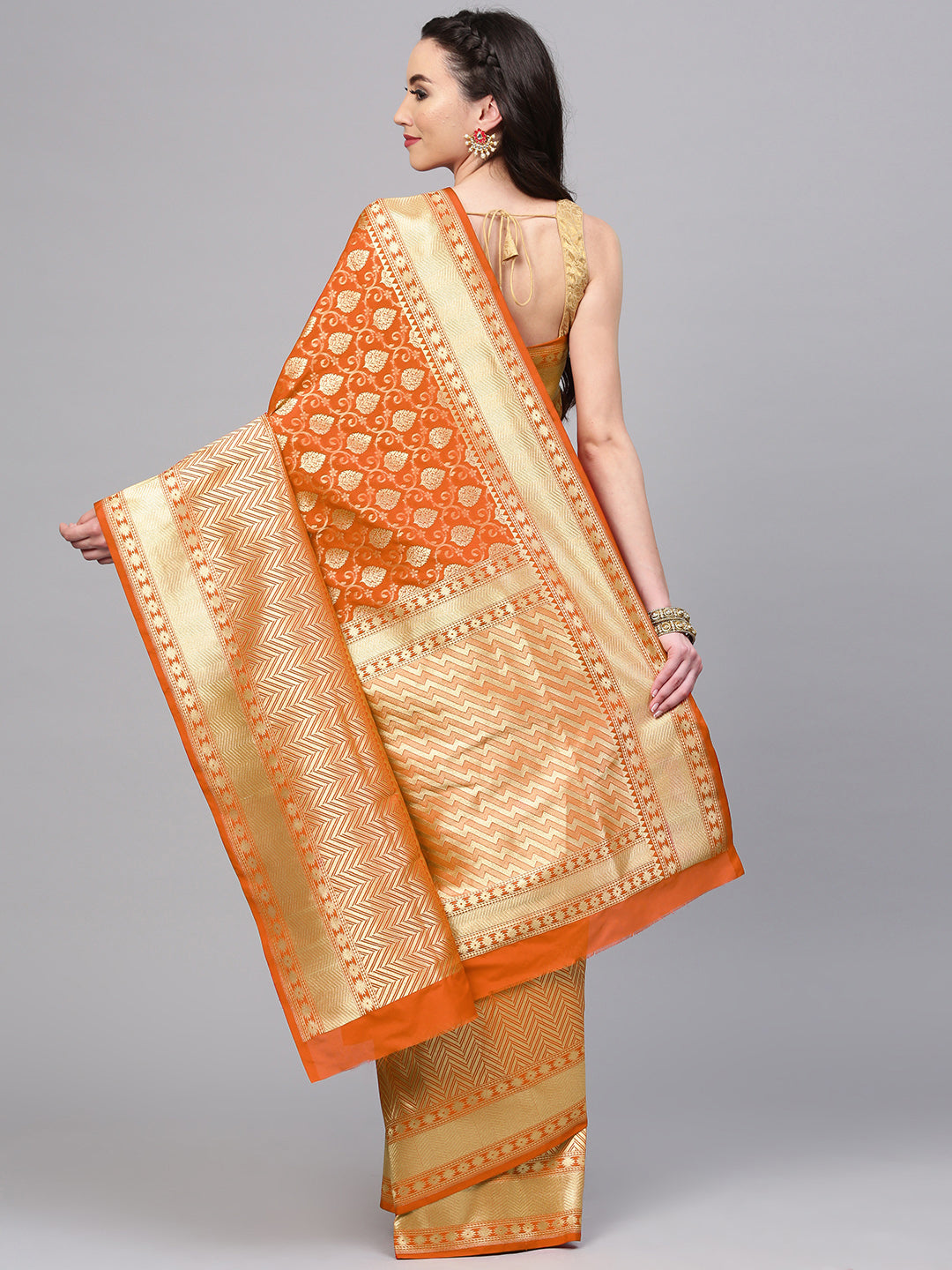 Orange Banarasi Handloom Silk Saree with intricate zari woven floral motifs