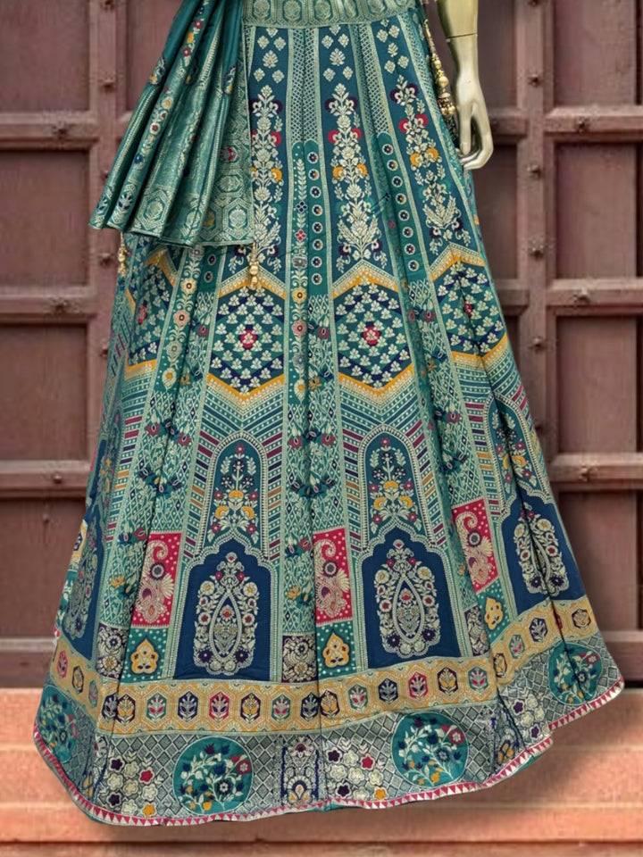 Teal Blue Silk Multicolor Kalidar Lehenga Choli with Zari Weaving & Mirror Embroidery with Tassels