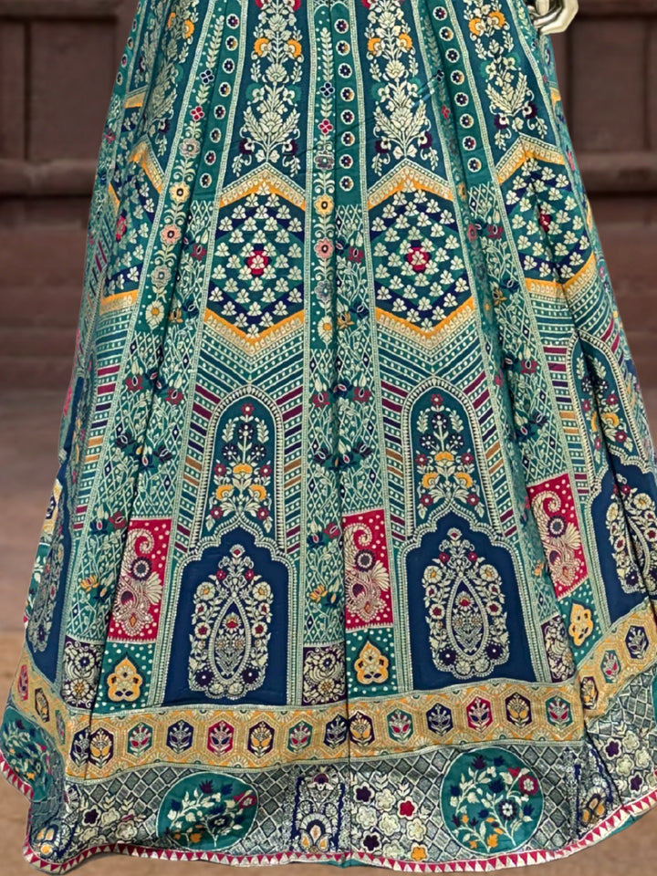 Teal Blue Silk Multicolor Kalidar Lehenga Choli with Zari Weaving & Mirror Embroidery with Tassels