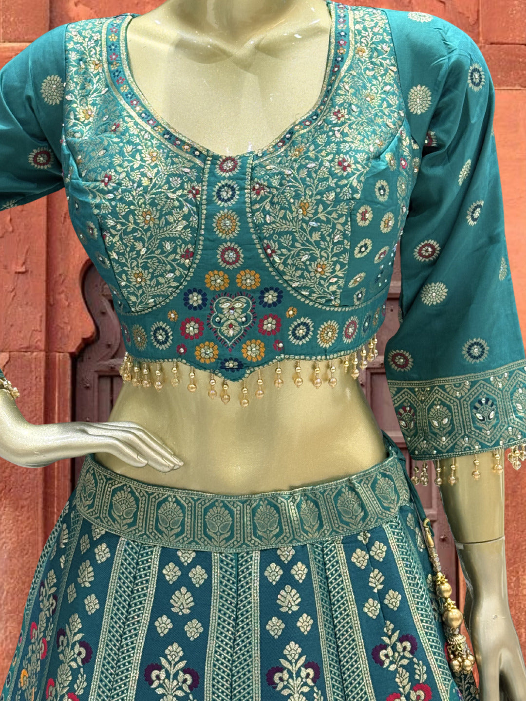 Teal Blue Silk Multicolor Kalidar Lehenga Choli with Zari Weaving & Mirror Embroidery with Tassels