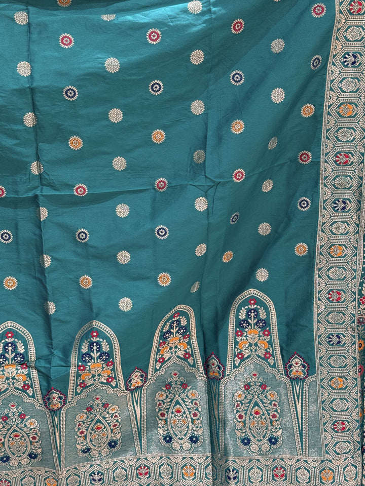 Teal Blue Silk Multicolor Kalidar Lehenga Choli with Zari Weaving & Mirror Embroidery with Tassels