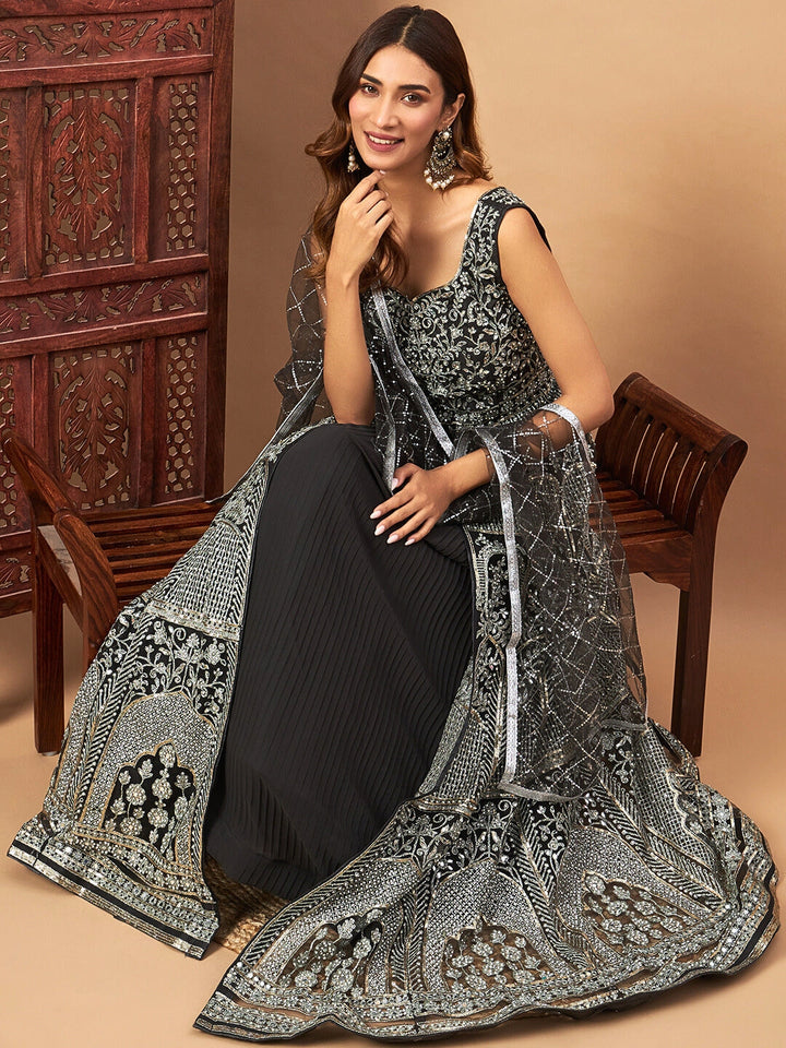 Long Front Slit Choli With Mirror Zari Embroidery, Pleated Lehenga & Net Dupatta