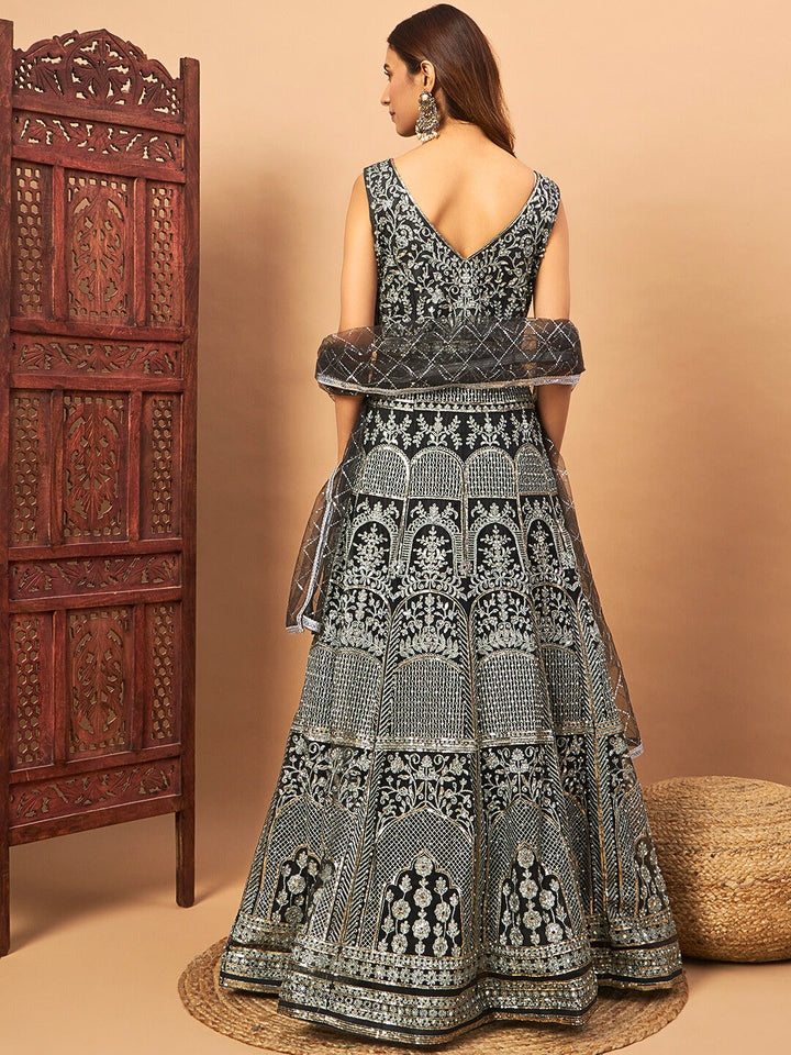 Long Front Slit Choli With Mirror Zari Embroidery, Pleated Lehenga & Net Dupatta