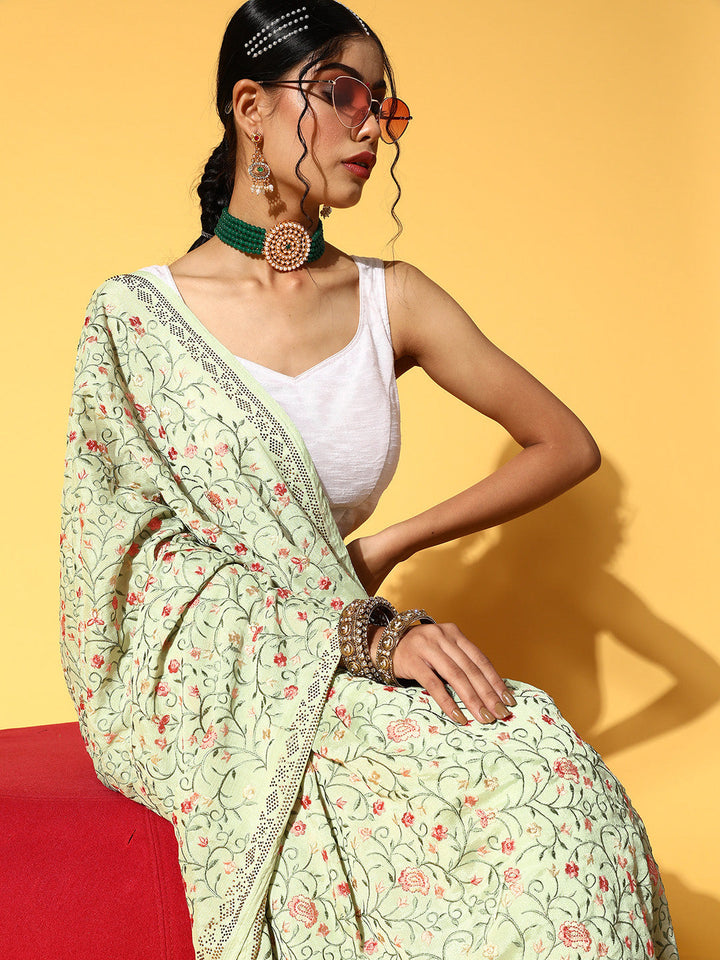 Pastel Green Resham Emboidered Chinnon Saree With Crystal Border