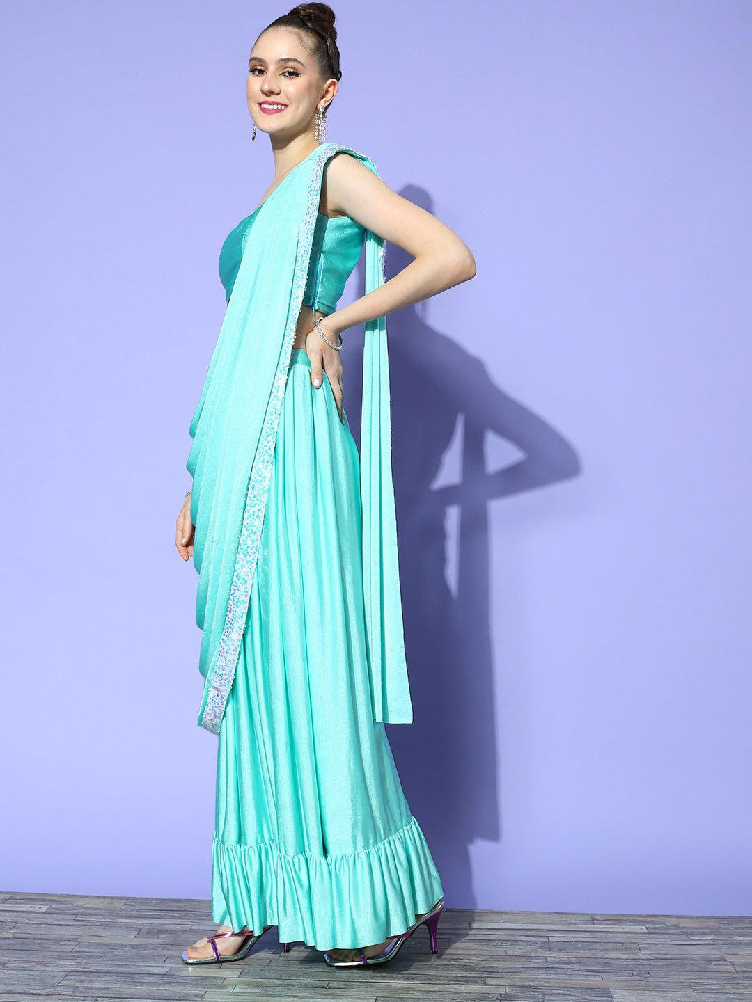 Draped Turquoise Lycra Sequence Ruffled Saree & Embellished Jacket