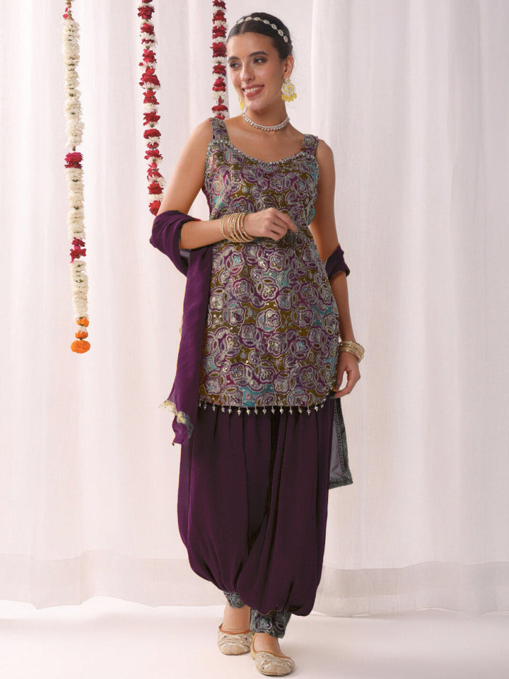 Multicolor Resham Embroidered Kurta Set with Harem Pants and Tasseled Curved Hemline